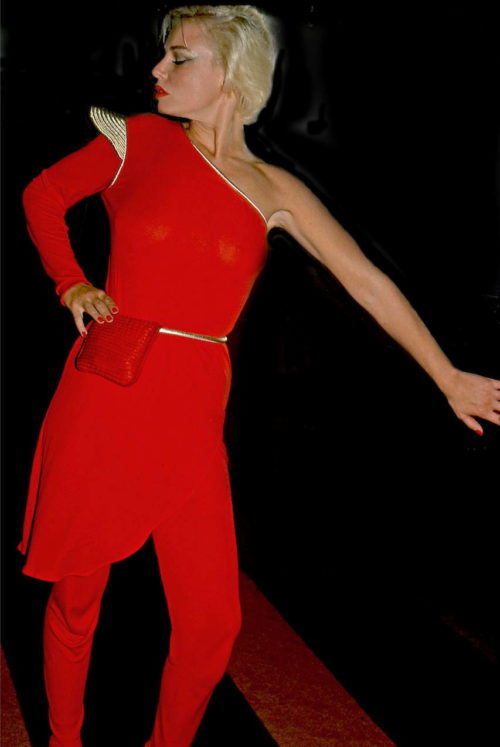 Rose Hartman (American, born 1937). Woman in Red (Valerie LeGaspi), Studio 54, 1977. Color photograph. Courtesy of the artist. © Rose Hartman